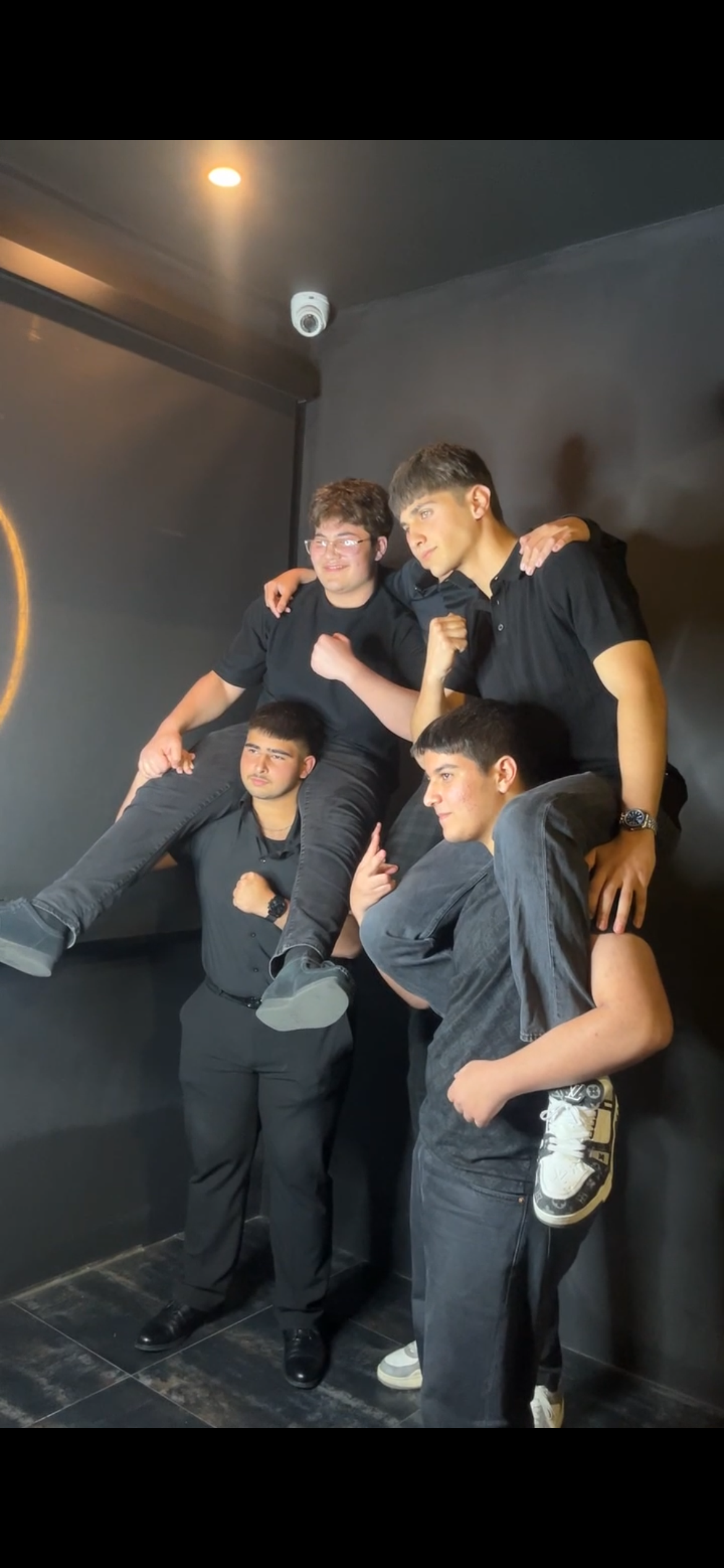A group of guests posing at the Cloud Nine photobooth